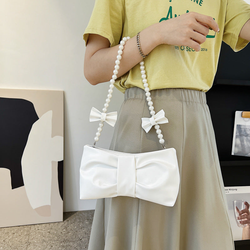 Wholesale PU Bow Fold Shoulder Bag